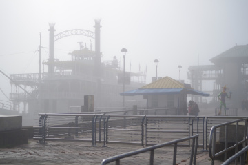 Mississippi riverboat in New Orleans in the early morning fog