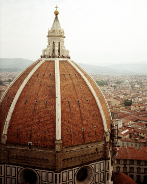 Looking down on the Duomo from the Campanile with florence in the background